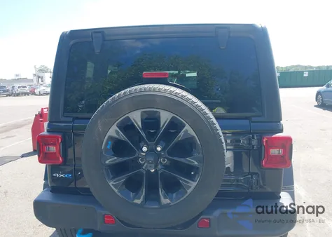 2023 Jeep Wrangler 4Xe Sahara 4X4 from USA, damaged, VIN 1C4JJXP67PW557208